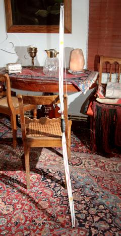 Ritualbogen mit Schlangen